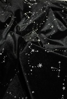 black fabric with white stars on it