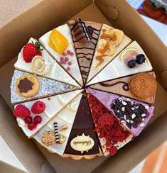 a cake in a box with different toppings