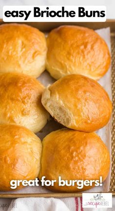 some bread rolls are in a box with the words, easy brioche buns great for burgers