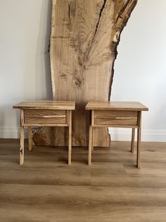 two wooden tables sitting next to each other on top of a hard wood flooring