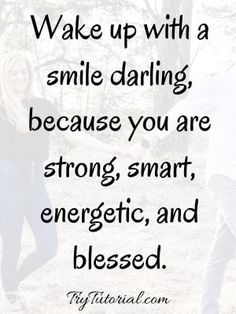 two people walking in the woods with a quote on them that says wake up with a smile daring, because you are strong, smart, energetic, and pleased