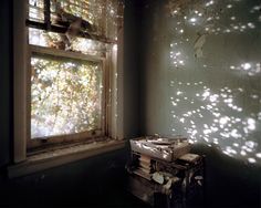 an old window with sunlight shining through it