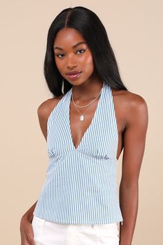 Sunny day dressing is effortless with elevated pieces like the Motel Rocks Nandu Blue and White Striped Cotton Poplin Halter Top! Crisp woven cotton poplin features a darling striped design as it shapes a tying halter neckline and a sleeveless bodice with seamed cups. Fitted silhouette continues down to a slightly cropped hem. Hidden zipper at side and elastic at back for fit. Fit: This garment fits true to size. Bust: Great for any cup size. Waist: Fitted - very fitted at natural waist. Underga Halter Top Designs, Sweden Fashion Summer, European Summer Tops, The Oc Style, Blue Tank Top Outfit, Style Inspo Casual, Nantucket Style Clothing, Drapey Tops, Blue And White Outfit