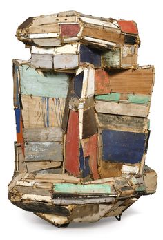 a pile of books stacked on top of each other in front of a white background