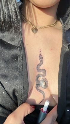 Snake Tatoos Aesthetic, Lower Back Snake Tattoo, Snake Tattoos Thighs, Snake Tattoo On Chest, Snake Tattoo Aesthetic, Chest Snake Tattoo, Sternum Snake Tattoo, Garter Snake Tattoo