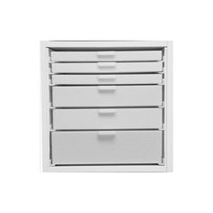 a white dresser with five drawers on it