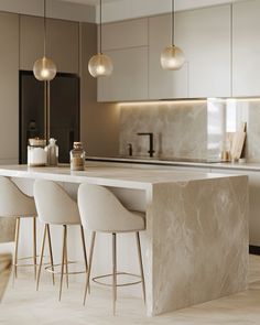 a kitchen with marble counter tops and bar stools