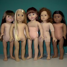 a group of dolls standing next to each other