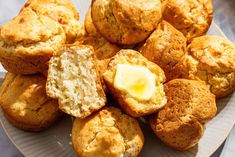 muffins on a plate with butter in the middle