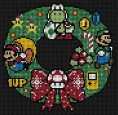 a cross stitch christmas ornament in the shape of a wreath with people around it