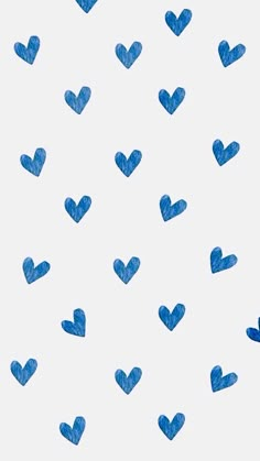 blue hearts drawn on white paper