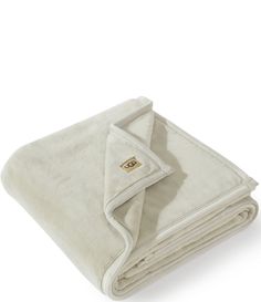 a white blanket folded on top of each other