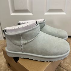 New In Box, Never Worn. Ugg Classic Ultra Mini, Color Goose Grey Ultra Mini Uggs, Grey Ugg Mini, Ugg Classic Ultra Mini Boots, Grey Mini Uggs, Blue Uggs, Blue Mini Ugh Boots, Ultra Mini Uggs, Ugg Classic Ultra Mini, Ugg Mini