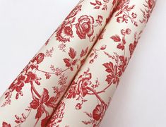 red and white floral print on the side of a pair of leggings