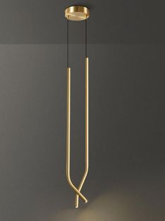 a light that is hanging from the ceiling with a long arm and two lights attached to it