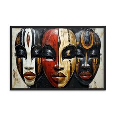 three masks are painted on a wall