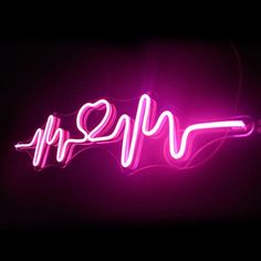 a neon sign that says my heart is in the air with a heartbeat on it