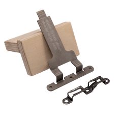 an image of a wooden block with two metal hooks on it's side and a pair of scissors next to it