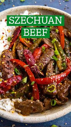 a bowl filled with beef, peppers and rice on top of a blue tablecloth