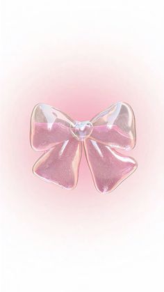 a close up of a pink bow on a white background with no people in it