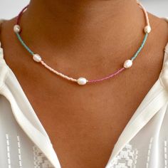 Embrace the ethereal allure of the Santorini Necklace, featuring a unique collection of high-quality baroque pearls in soothing blush, pink, and sea greens. Symbolic of purity and grace, pearls bring balance and tranquility to your life. Crafted for everyday elegance and healing, this necklace is a cherished gift that radiates beauty and serenity. Enjoy complimentary delivery within the UK. Necklaces feature five of the highest quality, organic baroque pearls. Beaded Jewelry Necklaces, Beaded Necklace Designs, Beaded Necklace Diy, Beads Bracelet Design, Summer Necklace, Beaded Accessories, Diy Schmuck, Girly Jewelry, Bead Jewellery