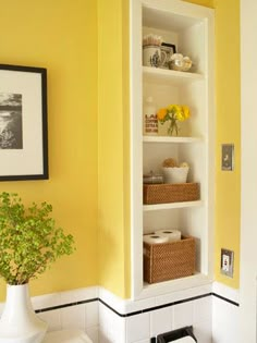 small bathroom ideas with wall storage space in yellow and white color scheme on pinterest