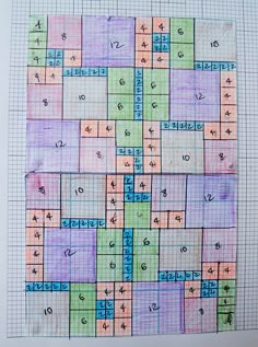 a drawing of a game board with numbers and times drawn on the gridded paper