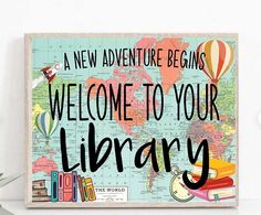 a wooden sign that says welcome to your library with books and hot air balloons in the background