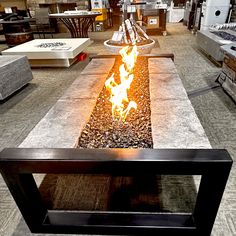 a fire pit sitting in the middle of a room