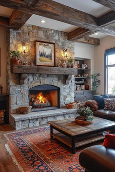 a living room filled with furniture and a fire place in the middle of a room