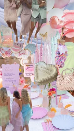 two women standing in front of a table with pink and blue decorations on it's walls