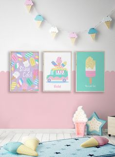 two ice cream posters on the wall in a child's room with pink walls