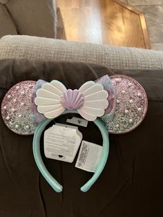 a minnie mouse ears headband with sequins