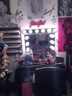 there is a vanity with lights and makeup on the table in front of her mirror