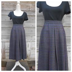 Vintage pleated plaid wool blend skirt  High waist with a side button closure and two pockets. The fabric is a wool blend (65% wool, 35% polyester, and 5% other fabric) with a plum, bluish purple, gray, and black plaid pattern. Acetate lining.  Made by Russ, it is in very good vintage condition.  Tag size: 10 PLEASE SEE MEASUREMENTS FOR BEST FIT Waist: 29" Hips: 40-44" Length: 32" ALL MEASUREMENTS ARE TAKEN WHILE GARMENT IS LAID FLAT THEN DOUBLED FOR BUST WAIST HIPS BUST - Armpit to armpit SHOULDER - Seam to seam WAIST HIP - 7" below waist LENGTH - Center back at collar base to hem SLEEVE LENGTH: Shoulder to cuff For reference, the dress form measures approximately 34-27-35 (bust-waist-hips) If you have any questions, or need any more photos or measurements please do not hesitate to ask. Pleated Plaid Skirt, High Waisted Midi Skirt, Bluish Purple, Skirts Midi High Waisted, Skirt Pleated, Plaid Skirt, Purple Gray, Dress Form, Gray Skirt