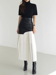 Tami Pleated Skirt with Faux Leather Patchwork - 2 Colors. Truly gorgeous and stylish skirt with a layered look of faux leather ini skirt patchwork upper over a pleated skirt. This midi to Max ankle length A-line pleated skirt is elegant with a cool geometric upper hemline that are body flattering and high fashion. Gender: WOMENItem Type: SkirtSilhouette: PleatedPattern Type: PatchworkMaterial: Cotton, Polyester, PU LeatherFabric Type: WovenDresses Length: Mid-CalfWaistline: Empire SIZE CHART Si Pu Skirt, Black And White Outfit, Pleats Pattern, Skirt Tulle, Stylish Skirts, Patchwork Skirt, Skirts Midi High Waisted, Chiffon Fashion