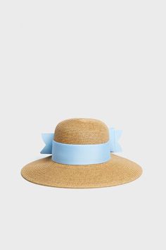 Exclusive Blue Packable Wide Bow Sunhat Vacation Sun Hat With Ribbon And Short Brim, Summer Beach Sun Hat With Ribbon, Spring Vacation Sun Hat With Ribbon, Summer Straw Hat With Ribbon For Beach, Summer Straw Hat With Ribbon For Vacation, Vacation Wide Brim Sun Hat With Ribbon, Vacation Straw Hat With Ribbon And Short Brim, Spring Vacation Straw Hat With Ribbon, Kentucky Derby Vacation Sun Hat With Ribbon