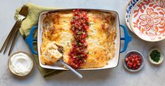 a casserole dish with meat and vegetables in it