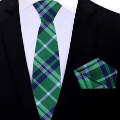 Introducing our refined silk necktie, boasting shades of green and blue in a sophisticated plaid pattern, exuding timeless elegance and versatility. Here's how to effortlessly style this classic accessory for various occasions: Dress Shirts: Crisp white dress shirt: Provides a clean and polished canvas, allowing the subtle hues of green and blue in the plaid pattern to shine. Light blue dress shirt with a micro-check pattern: Enhances the ensemble with subtle texture and visual interest, complem Tie Ideas, Charcoal Gray Suit, Light Blue Dress Shirt, Light Grey Suits, Tie Matching, Navy Blue Suit, Tie Length, Plaid Tie, Light Blue Dresses