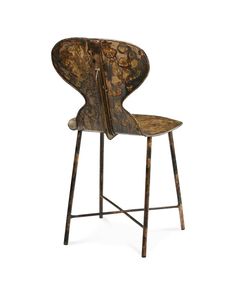 a chair that is made out of wood and metal with an open seat on the back