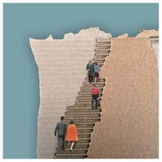 several people walking up and down stairs in front of a blue wall that has been torn apart