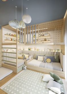 a bedroom with bunk beds and soccer balls on the floor