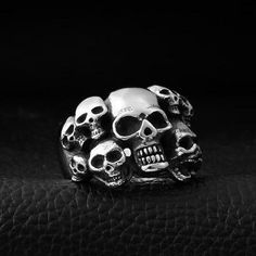 The most powerful fallen souls in history are encased in this steel skull ring for men. with such an asset on your finger, nothing can stop you! Back in the medieval ages witchcraft was used way more often than now, this skull ring steel tells us a story about a group of warriors who sought to claim the abilities of a powerful wizard so they attacked him at night but were surprised since he predicted their attack and countered it with a strong spell that caged their souls into a ring that the wi Group Of Warriors, Ring Steel, Skull Wedding Ring, Medieval Ages, Skull Wedding, Ring For Men, Skull Ring, Color Ring, Most Powerful