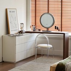 a bedroom scene with focus on the dresser and chair, along with an open window