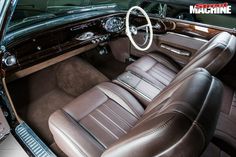 the interior of an old car is clean and ready to be used