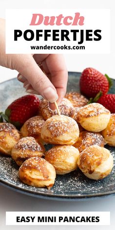 mini pancakes with powdered sugar on top and strawberries in the background text reads easy mini pancakes