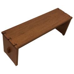 a wooden bench with an attached shelf for storage and holding items on it's sides