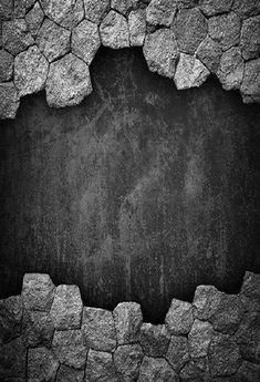 a black and white photo of a cracked concrete wall with cracks in the middle, as an abstract background