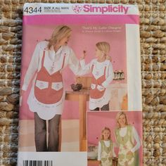 the sewing pattern shows two women in aprons