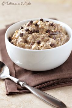 a bowl of oatmeal with chocolate chips on top